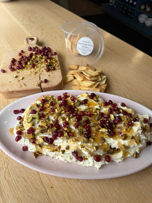 Food Nanny's Layered Whipped Feta with Hot Honey, Pomegranates & Pistachios